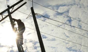 man working on power lines