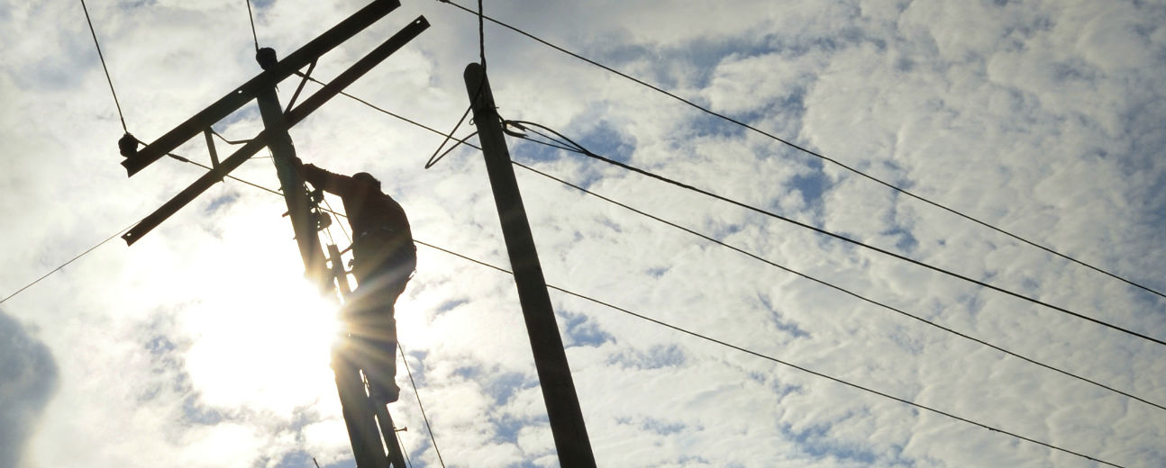 man working on power lines