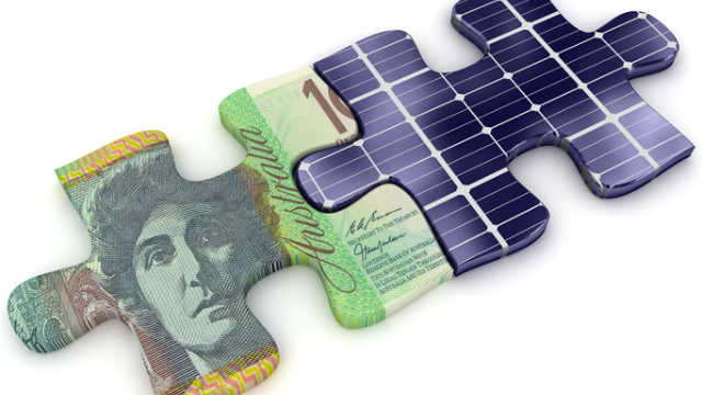 money and solar panel puzzle pieces