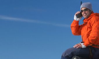 Man using satellite phone