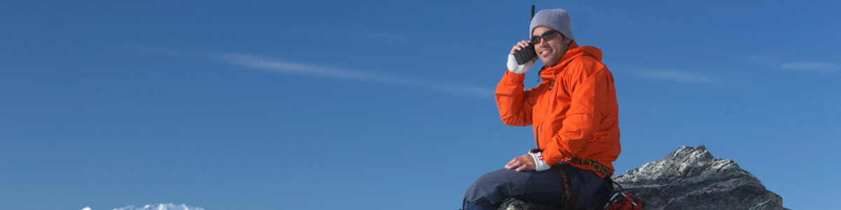 Man using satellite phone