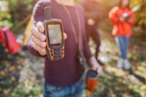 Man holding satellite phone