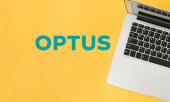 Laptop against yellow background with Optus logo