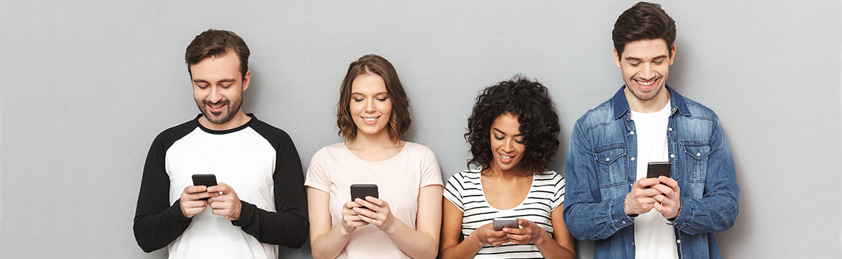 Group of people on phones. Are Telstra phones unlocked.