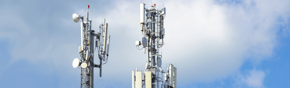 Mobile towers with blue sky. Network coverage concept