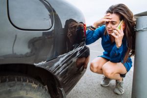 girl scratched car