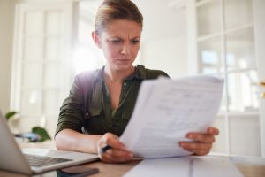 women reading bill