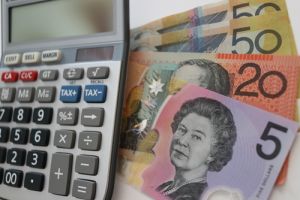 Budgeting for future, Australian currency and calculator