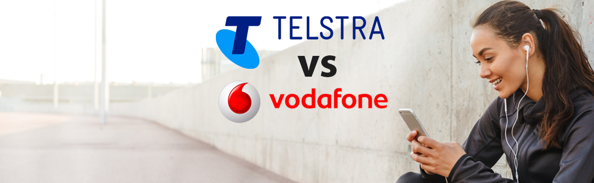 Woman holding phone with Telstra and Vodafone logos