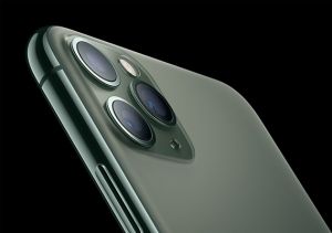 Closeup of midnight green iPhone 11 Pro triple rear cameras