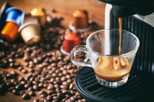 capsule coffee machine pouring a coffee