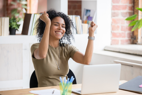 Lady happy laptop