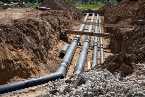 Underground pipes dug up in yard