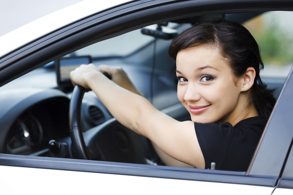 Young driver in hire car