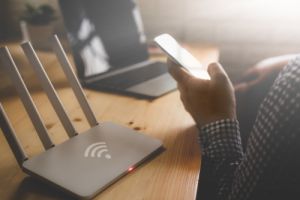 man on phone using wifi