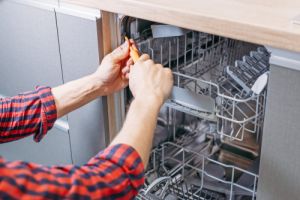 Should I repair or replace my dishwasher? 