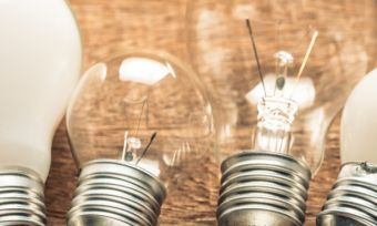 Light bulbs on wooden table