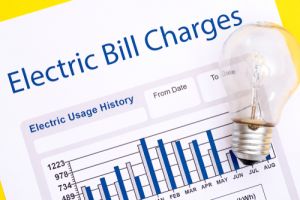 Electricity bill with light bulb in front