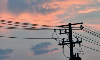 electricity pole sunset