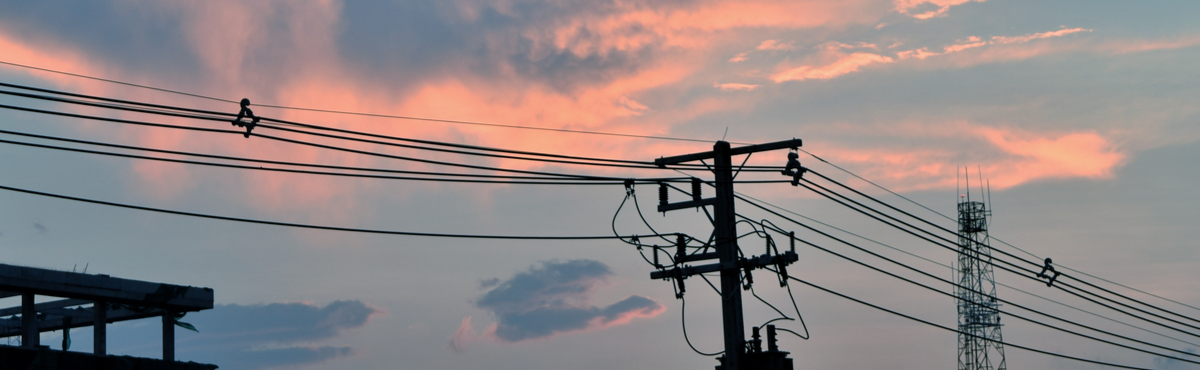 electricity pole sunset