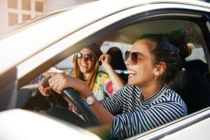 girls driving in a car