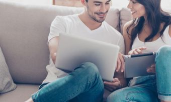 Couple with laptops