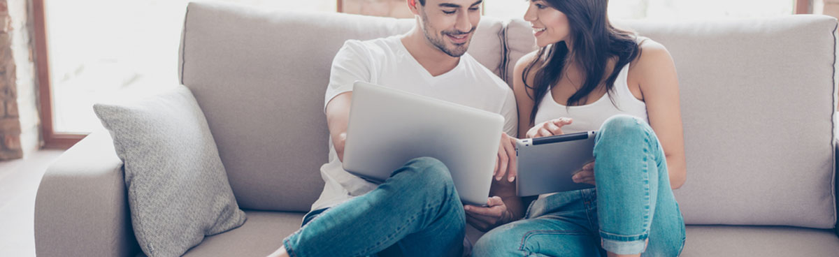 Couple with laptops