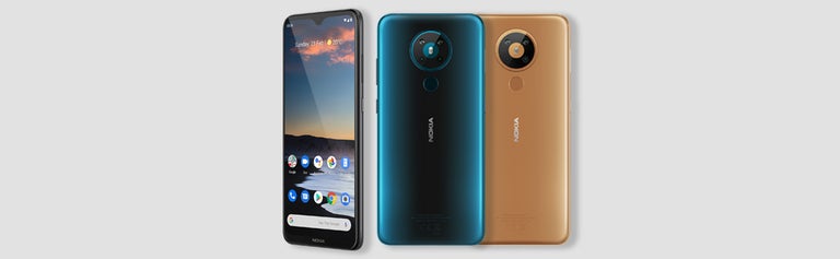 Nokia 5.3 phone in three colours against light background