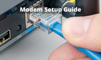 Hand plugging cable into modem