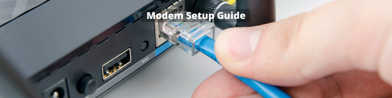 Hand plugging cable into modem