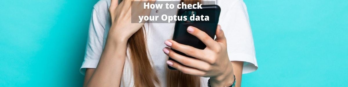 A person using a phone to check their Optus balance