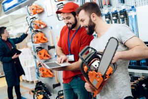 Man buying chainsaw