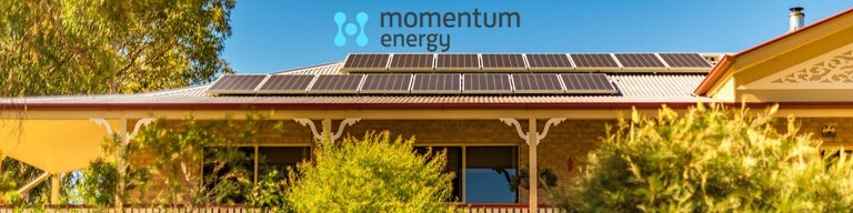 House in QLD with solar panels and Momentum Energy logo