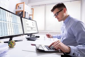 Man using accounting software