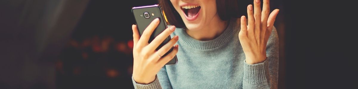 A woman looking at a phone