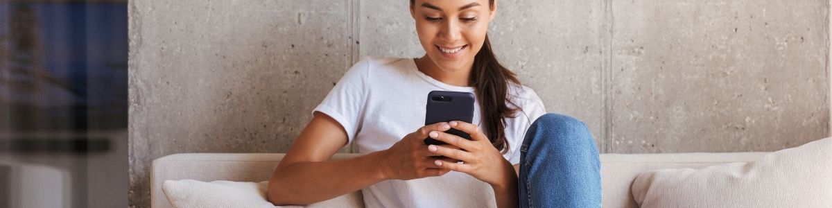 A woman holding a phone