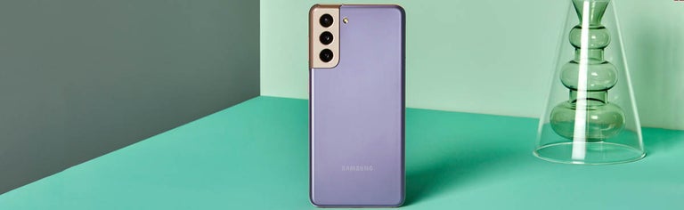 Samsung Galaxy S21 in violet against a green background