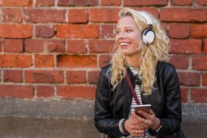 Girl listening to music with headphones