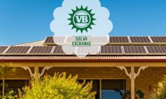 Solar panels on house roof with VB Solar Exchange logo