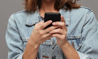 Woman using Android phone