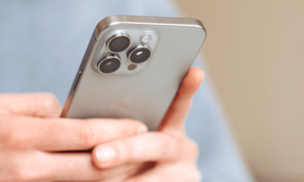 Man using new iPhone