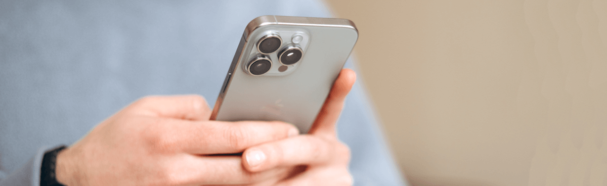 Man using new iPhone