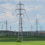 Powerlines over green open space