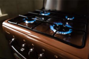 Gas stovetop with blue flame