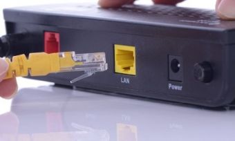 An NBN modem having an ethernet cable plugged into it