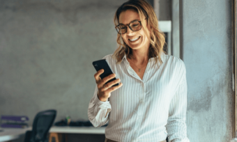Business woman using mobile phone