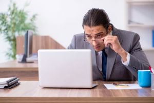 Man looking at laptop