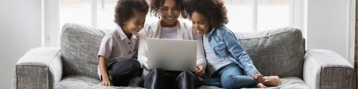 A family using a laptop