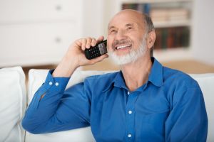 Man talking on cordless phone