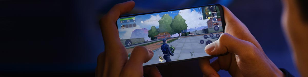 Closeup of person playing game on OPPO A94 5G phone